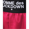 comme des fuckdown - shorts in raso fuxia
